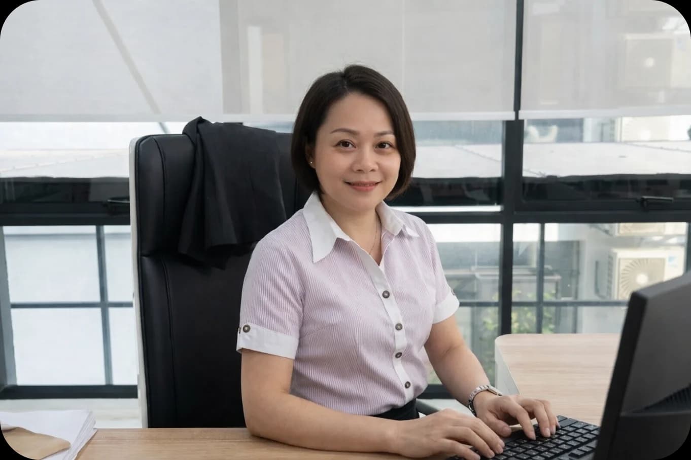 Staff member ready to assist with employment contract renewal